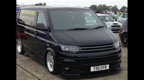 Black Volkswagen Van Parked In A Lot
