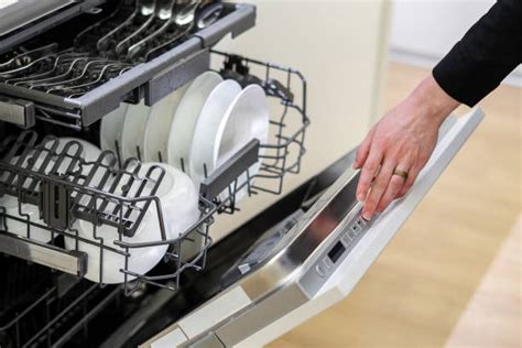 Full Dishwasher Stock Photos Pictures And Royalty Free Images Istock