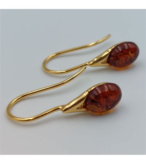 Boucle d oreilles en Ambre couleur cognac avec en argent 925 doré