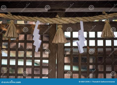 Shimenawa And Shide In Front Of A Shinto Shrine Door Royalty Free Stock