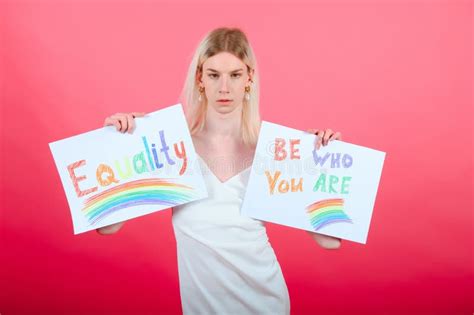 Youth Transgender Lgbt Looking At Camera While Posing Isolated Over Nude Color Background Stock