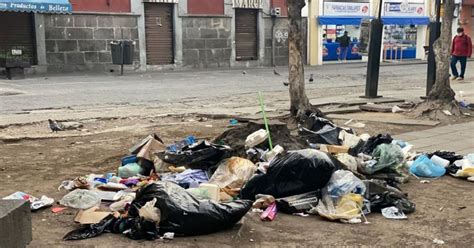 Centro Histórico de Puebla amanece con montones de basura pese a