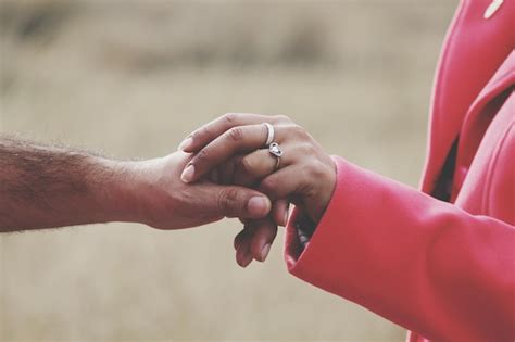 Premium Photo Cropped Image Of People Holding Hands Outdoors