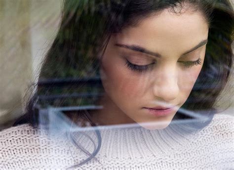 Woman Looking Down Photograph By Ian Hooton Science Photo Library