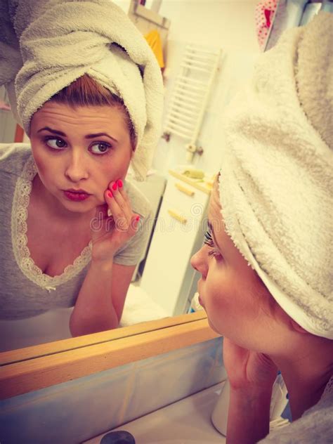 Woman Looking At Her Reflection In Mirror Stock Photo Image Of