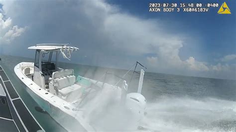 Deputy Jumps Between Two Moving Boats