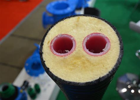 A Close Up Of Red Hot Water Plastic Pipes Pex Tubing Insulated In One Pipe Pre Insulated