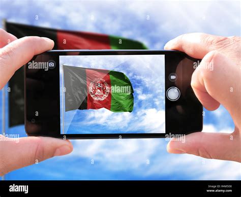 Afghanistan men hold hands hi-res stock photography and images - Alamy