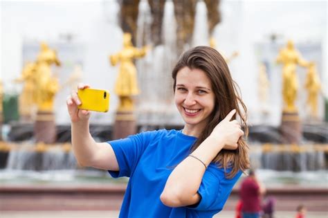Premium Photo Beautiful Smiling Brunette Woman Take A Picture Of