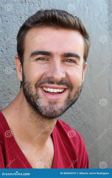 Portrait Of Good Looking Smiling Bearded Man With Perfect White Teeth