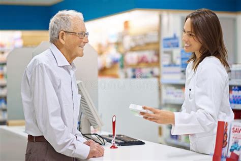 Filling Prescriptions Are Just Part Of Her Job A Young Pharmacist