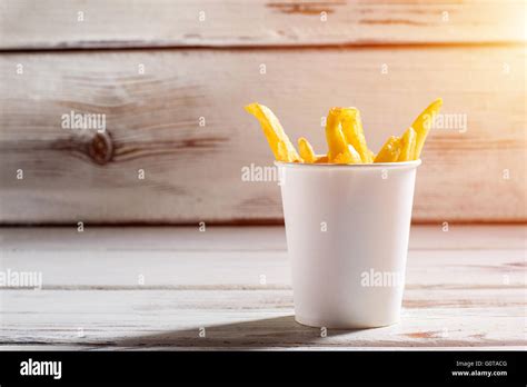 French fries in a cup Stock Photo - Alamy