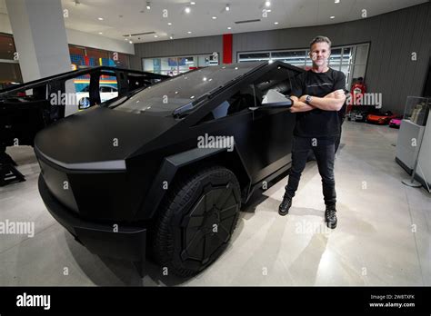 Tesla Chief Designer Franz Von Holzhausen Poses For Photos In Front Of