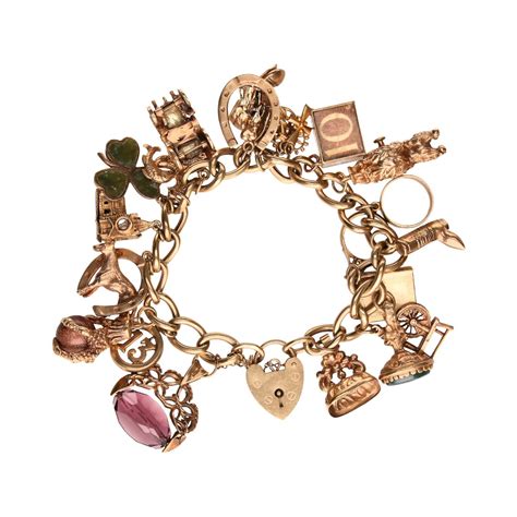 9CT GOLD CHARM BRACELET