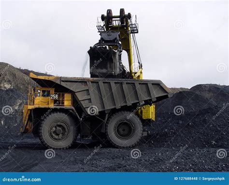 Loading Coal Into A Mining Dump Truck Stock Photo Image Of Industrial