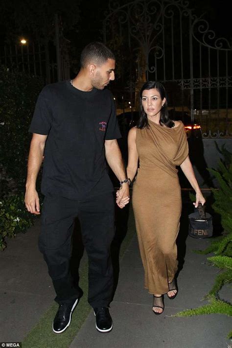 Kourtney Kardashian Flaunts Her Figure In Tight Beige Dress For Romantic Date Night With Toyboy