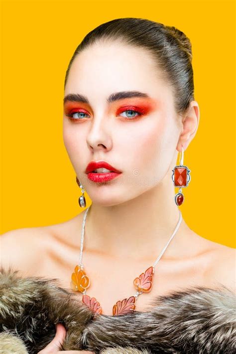 Close Up Beauty Portrait Of Young Woman With Professional Make Up