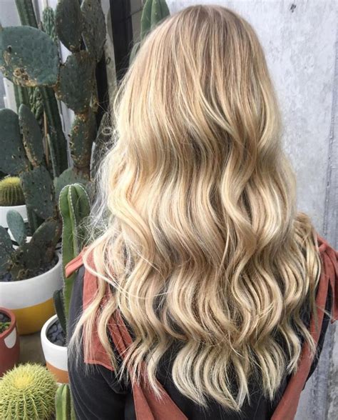 Soft Waves And Creamy Honey Blonde Hair