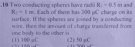 Answered 10 Two Conducting Spheres Have Radii R 0 5 M And R 1 M Each