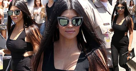 Kourtney Kardashian Displays Her Smokin Hot Figure In A Sexy Cut Out Jumpsuit Mirror Online