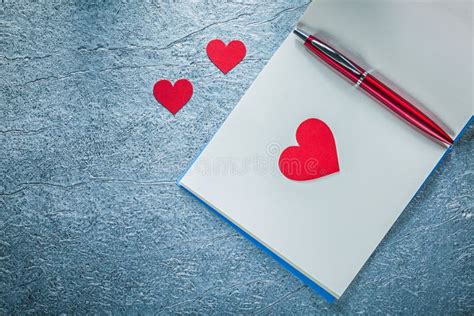 Set Red Hearts Biro Pen Clean Notepad Metallic Background Stock Photos