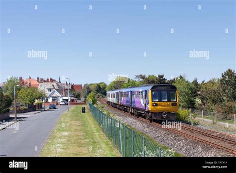 Arriva Northern Rail Class 142 Pacer Train 142054 With Class 150 Sprinter 150149 Passing Andsell