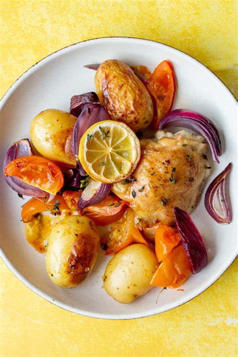 Lemon And Thyme Chicken Thigh Tray Bake Beat The Budget