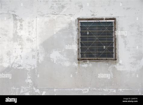 Dusty White Ancient Building Facade With Glass Louver Windows Stock