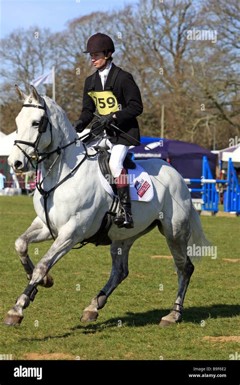 Man riding horse helmet uk hi-res stock photography and images - Alamy