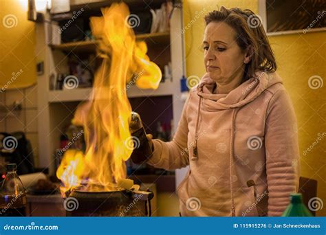 Woman Prepares A Fire Tongs Punch Stock Photo Image Of Gourmet Bowl