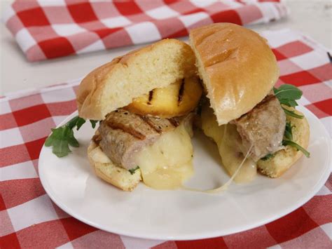 Grilled Turkey Burger Stuffed With Pepper Jack Cheese Topped With Grilled Peaches