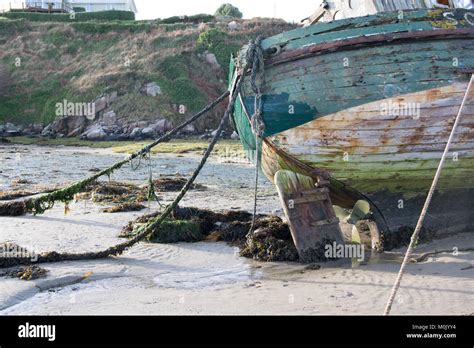 Old Wrecked Fishing Boat On The Donegal Coast In Ireland Stock Photo