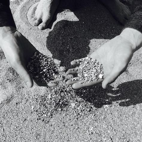 Premium Photo Close Up Of Hands Holding Sand