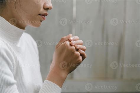 Woman Praying For Thank God Praying With Her Hands Together To Think Of