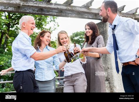 Office Colleagues Drinking Beer After Work Stock Photo 160390768 Alamy