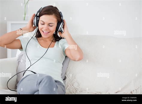 Charming Brunette Listening To Music Stock Photo Alamy