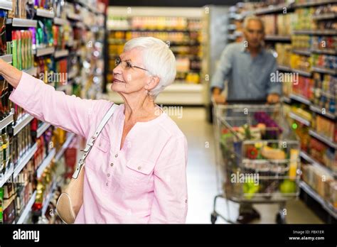 Elderly Woman Shopping Trolley Walking Hi Res Stock Photography And