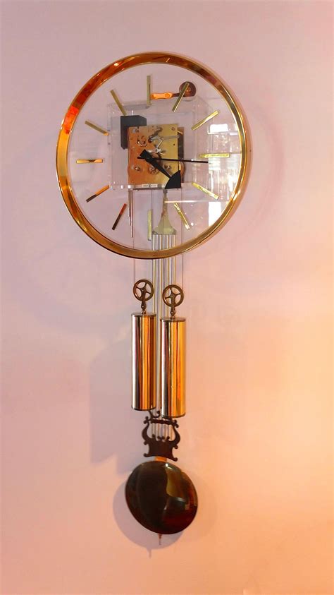 Arthur Umanoff For Howard Miller Brass And Lucite Wall Clock At Stdibs