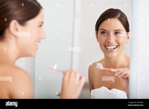 Dental Health Is Important A Young Woman Standing In Front Of The