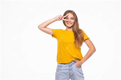 Premium Photo Young Smiling Woman Showing Victory Or Peace Sign