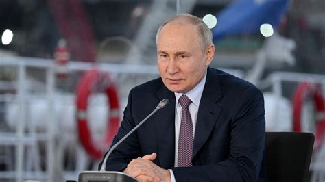 Vladimir Putin announces candidacy for Russian presidential election in ...