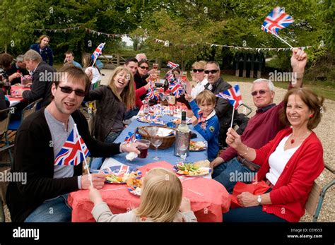 People Celebrating At A Traditional English Street Party Stock Photo