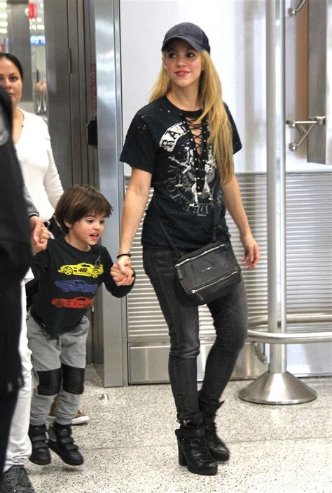 Shakira With Her Family at the Airport in Miami 12/19/ 2016 • CelebMafia