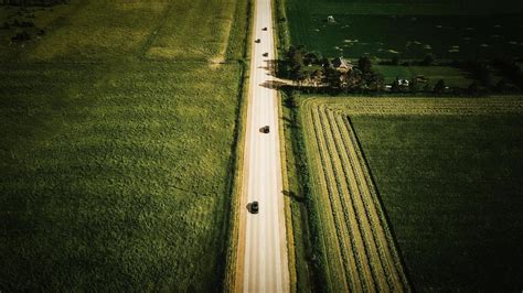 Aerial view of green grass field 1369968 Stock Photo at Vecteezy