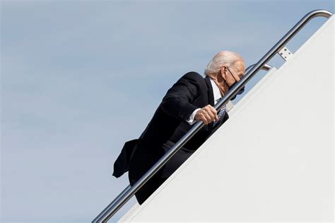 Biden Falls As He Climbs Up Stairs To Air Force One