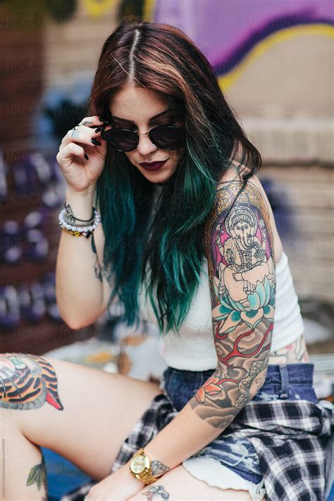 Portrait Of A Woman With Piercings And Tattoos By Stocksy Contributor