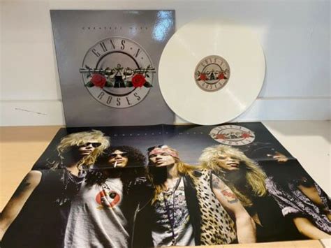 Popsike GUNS N ROSES GREATEST HITS BRAND NEW WHITE MARBLED