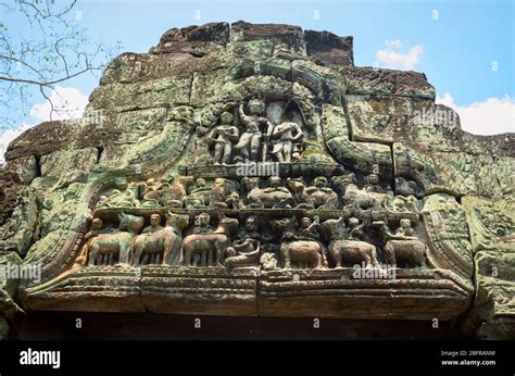 Carvings Of Demons And Apsara Dancers From Hindu Mythology On A Door