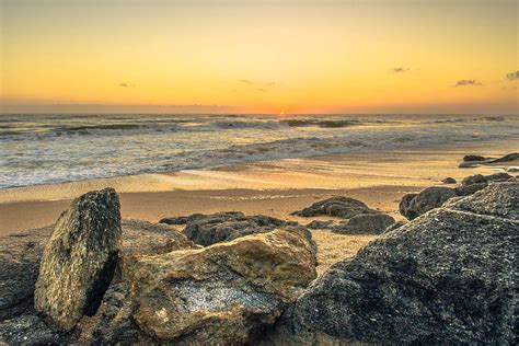 Coquina Rocks Sunrise In New Smyrna Beach Photograph By Danny Mongosa