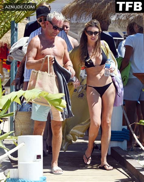 Abbey Clancy Sexy Seen Showing Off Her Enviable Beach Body Wearing A Black Bikini In Portugal